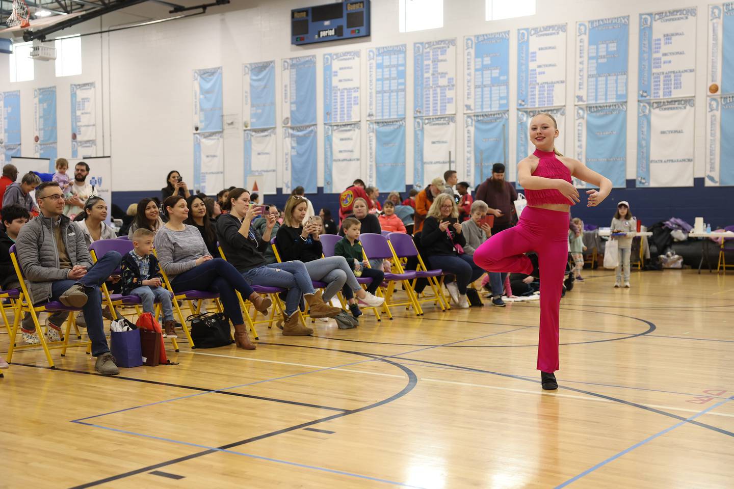 Thrive Dance Team’s Olivia Fariss, 12, does a dance routine for the crowd at the Will County Executive 2024 Kids’ Fair at Troy Middle School in Plainfield on Monday, Feb. 19, 2024.