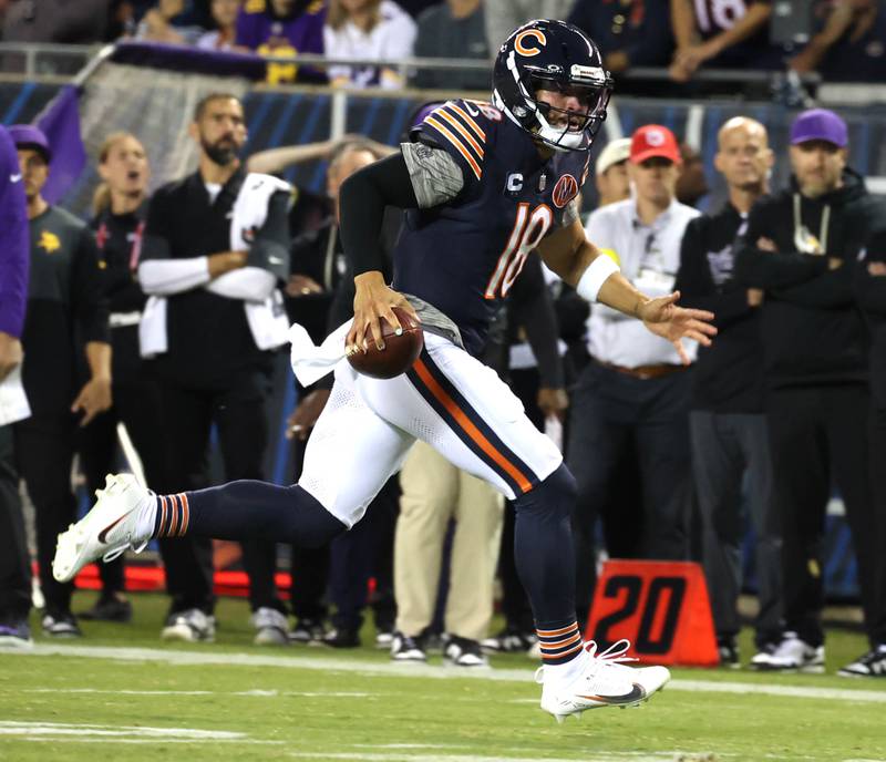 Chicago Bears quarterback Caleb Williams scrambles for the first touchdown of the game against the Minnesota Vikings Monday, Sept. 8, 2025, at Soldier Field in Chicago.