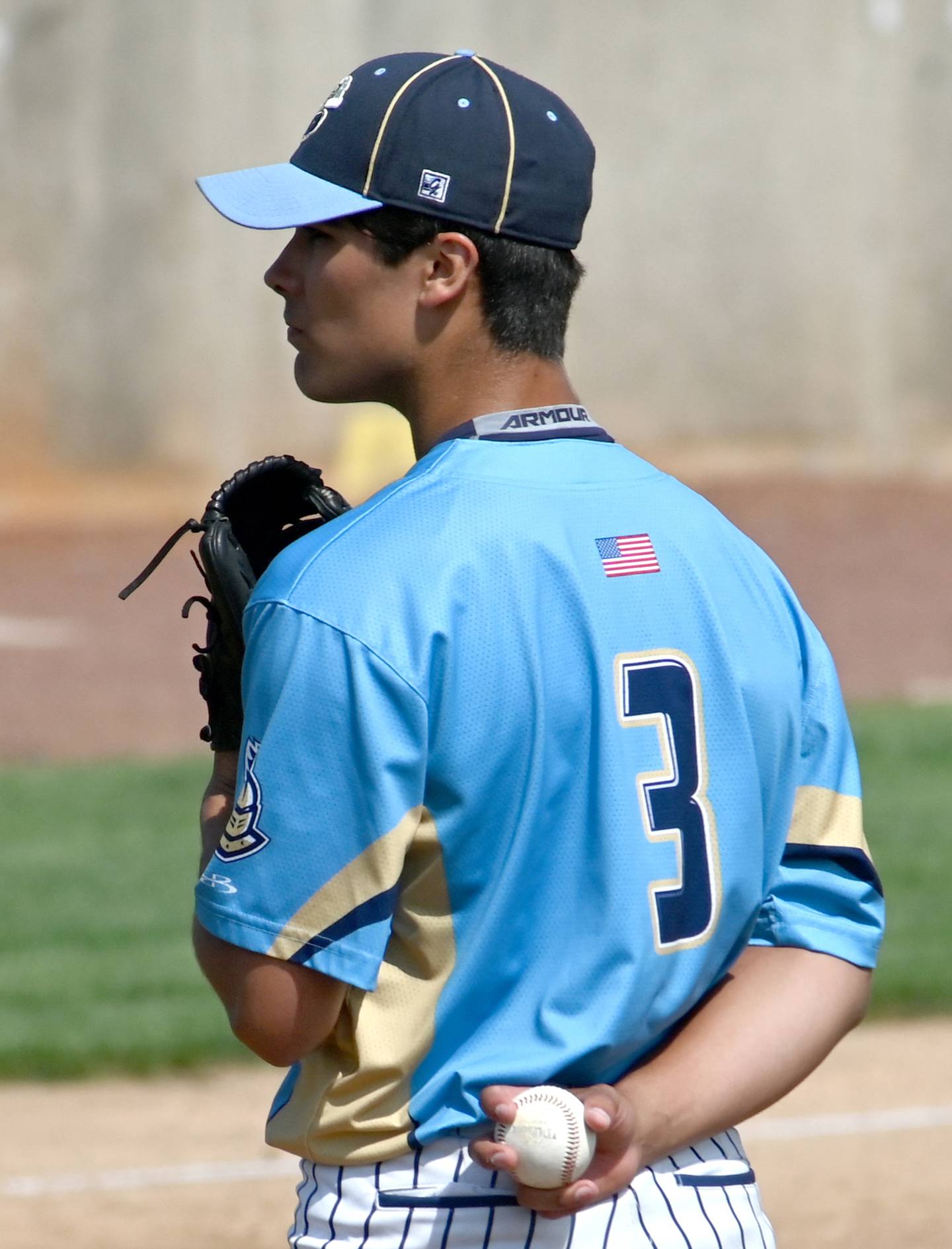 Marquette pitcher Taylor Waldron gets the signal before pitching to a Newman batter Monday during the supersectional.