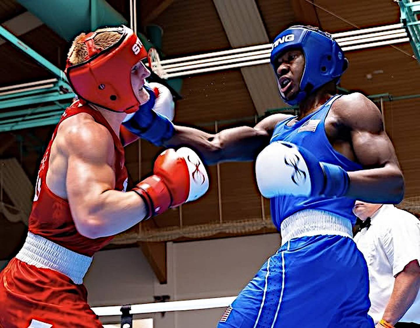 Joliet's JoJo Awinongya (right) lands a punch against Poland's Fabian Urbanski in the 80 kg semifinal bout at the Brandenburg Cup.