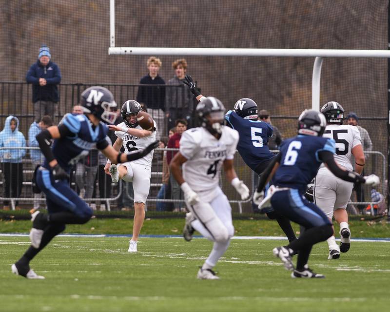 Fenwick's Noah Sur (6) punts the ball away while taking on Nazareth Academy during the 6A semifinals game on Saturday Nov. 22, 2025, held at Nazareth Academy High School in La Grange Park.