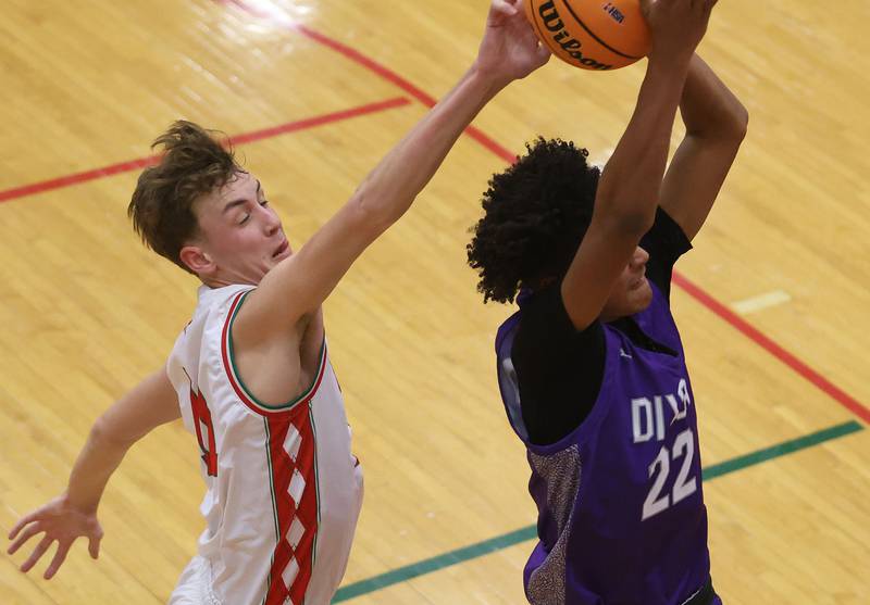 L-P's Jameson Hill blocks a pass intended for Dixon's Xavion Jones during the Class 3A Regional semifinal game on Wednesday, Feb. 25, 2026 in Sellett Gymnasium at L-P High School.