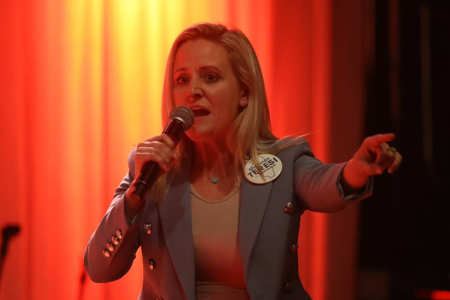 Shannon Teresi, candidate for Comptroller, speaks at the GOP rally at 115 Bourbon Street in Merrionette Park on Monday.