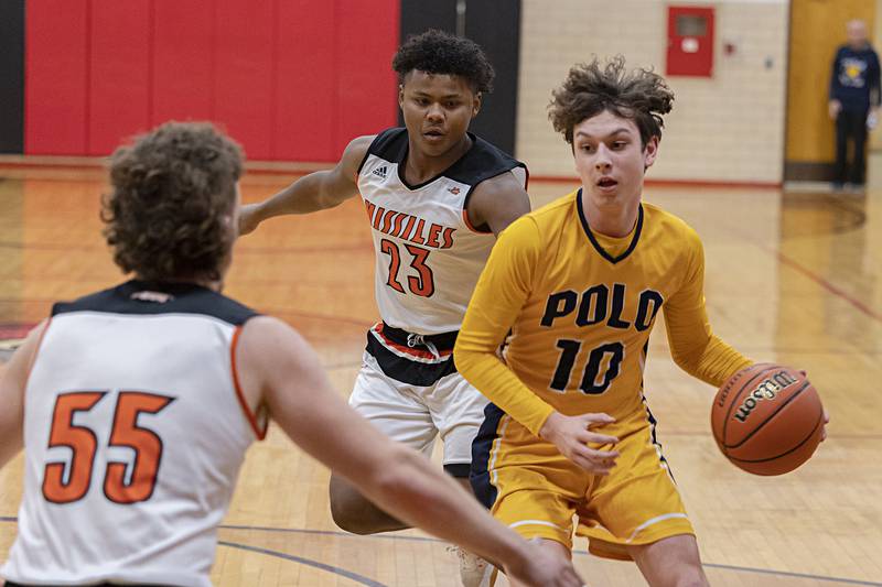 Polo’s Carter Merdian handles the ball against Milledgeville Monday, Dec. 19, 2022 in the Forreston Holiday Tournament.