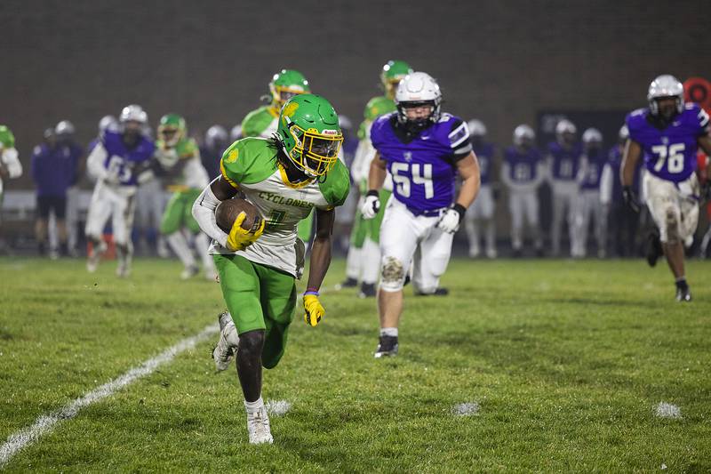 Chicago Ag Science’s Trevon Williams picks up yards early in the game against Dixon Friday, Nov. 8, 2024 in the second round of the Class 4A football playoffs.