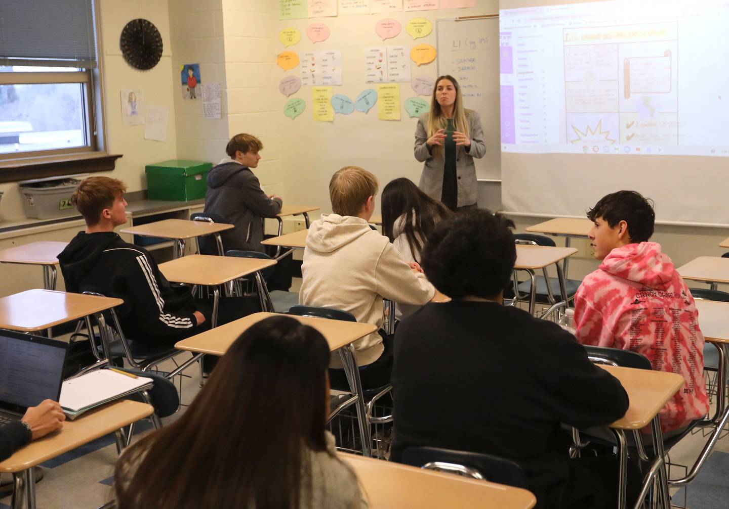 Maria del Carmen Hans Villa teaches a dual language Latin American culture class on Monday, Feb. 2, 2026, at Woodstock High School. In 2025, a total of 136 graduates from Woodstock and Woodstock North high schools earned the Illinois State Seal of Biliteracy.