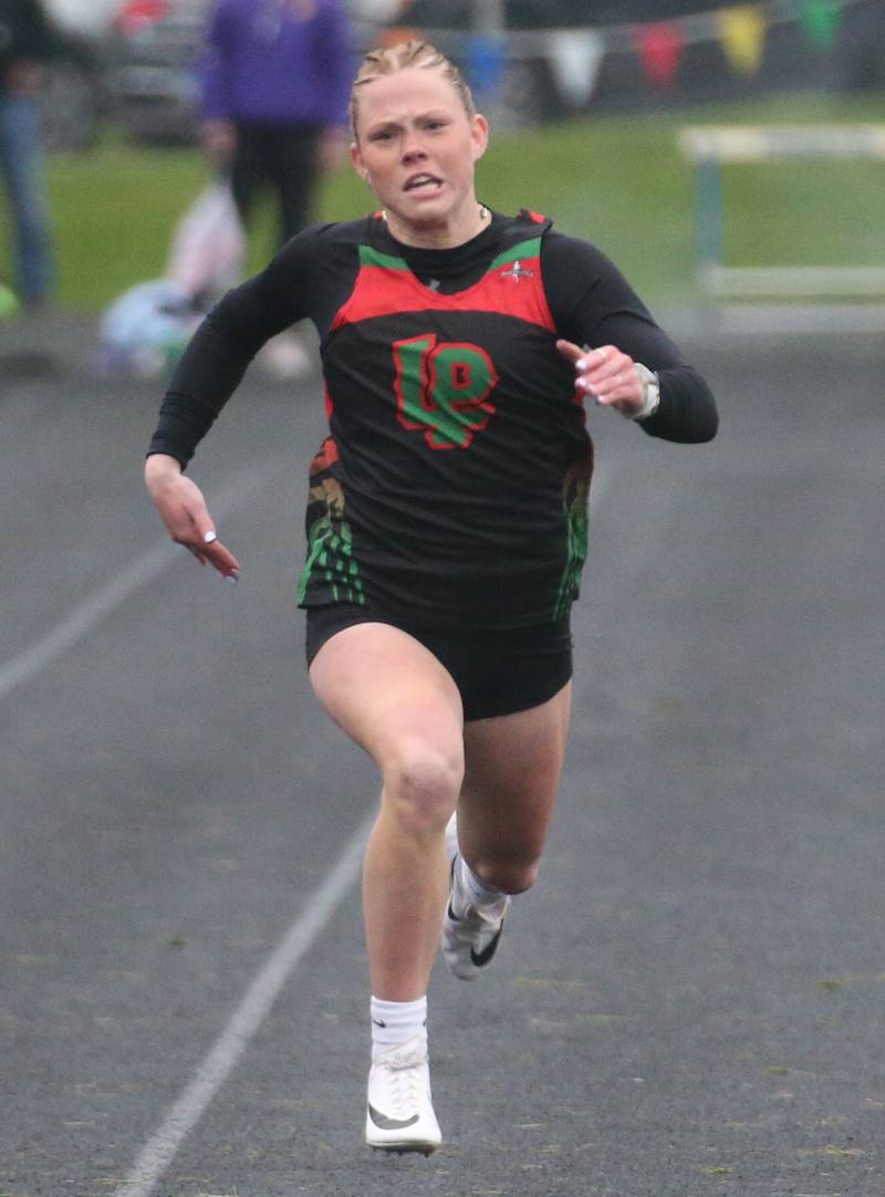 L-P's Elli Sines competes in the 100 meter dash during the Class 2A girls track and field Sectional on Thursday, May 9, 2024 in Princeton.