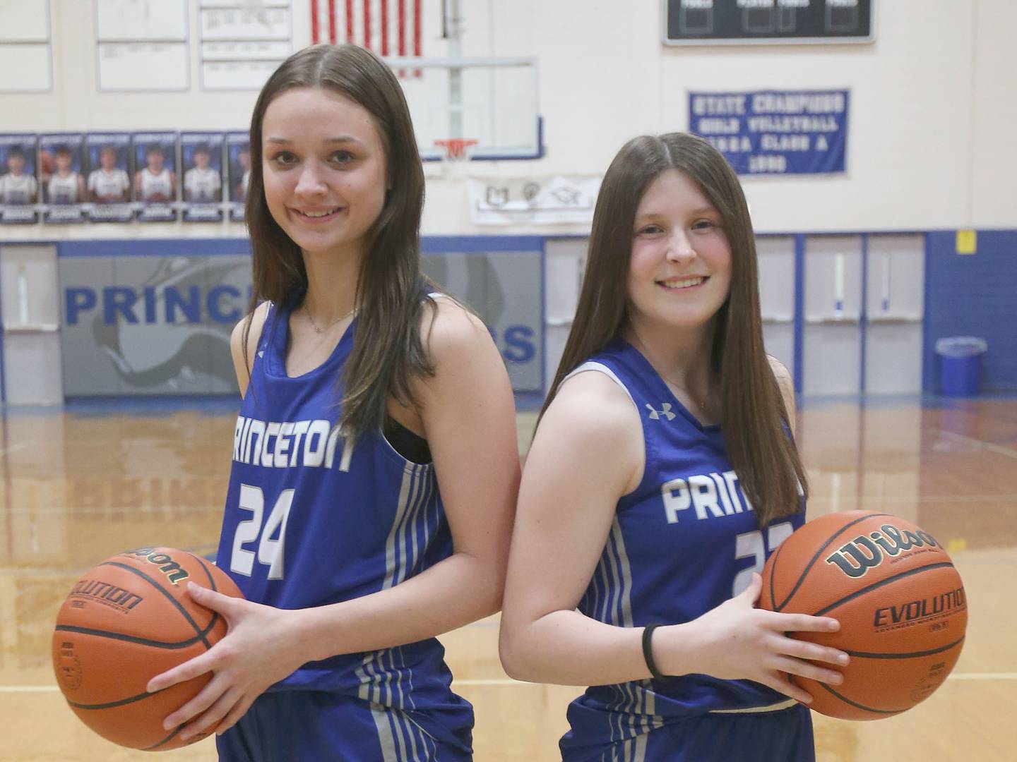 Princeton's Keighley Davis and Camryn Driscoll pose for a photo in Proudy Gym on Wednesday, March 12,, 2025. The girls are the 2024-2025 Bureau County Republican girls basketball players of the year.