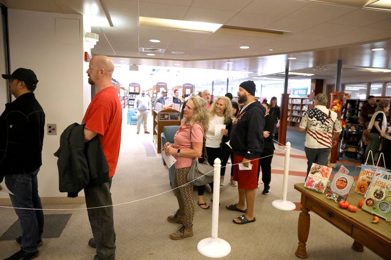 Kane County residents line up to vote in the General Election inside the Town and Country Library on Tuesday, Nov. 5, 2024 in Elburn.
