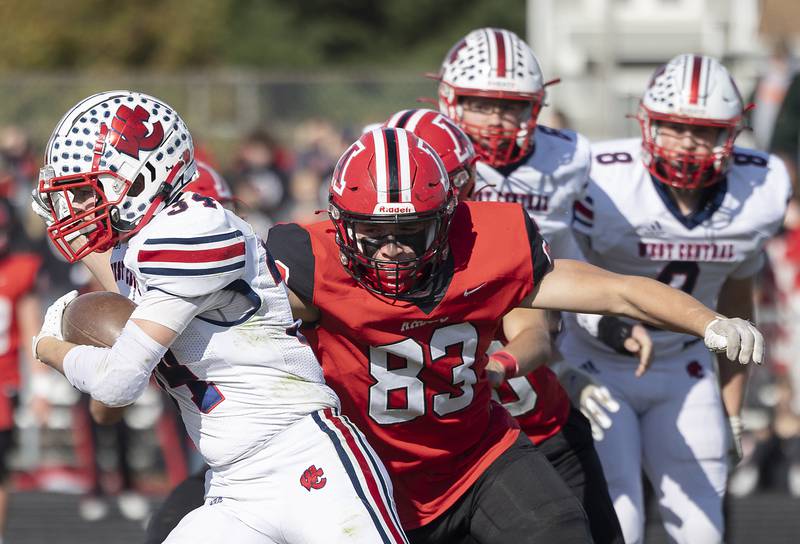 Amboy’s Evan Flanagan gets a hand on West Central’s Kyle Lafary Saturday, Nov. 2, 2024, in the 8-man football league first round playoffs.Saturday, Nov. 2, 2024.