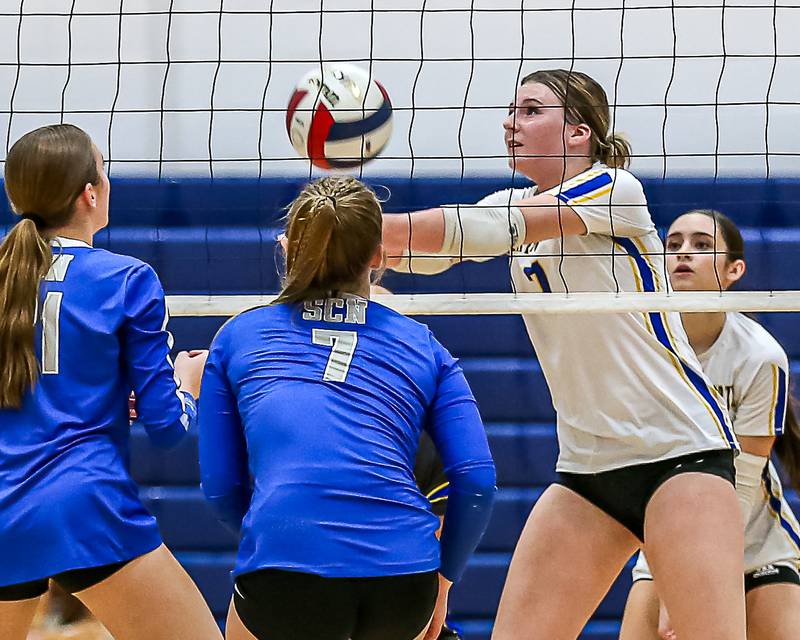 Wheaton North's Mary kate Whittington (7) bumps the ball during Class 4A Lake Park Regional final volleyball match between Wheaton North at St Charles North.  Oct 31, 2024  in Roselle.
