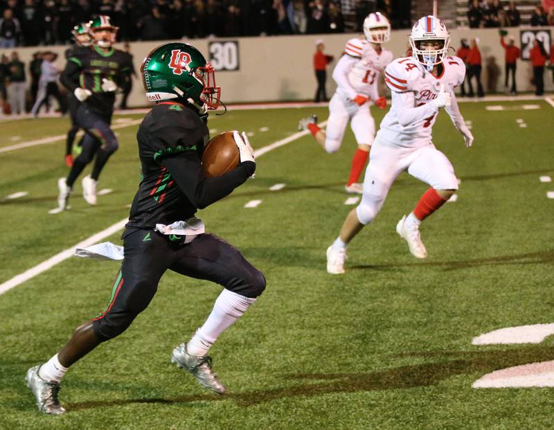 L-P's Cordell Wheatly runs the ball down the field against Ottawa on Friday, Oct. 6, 2023 at Howard Fellows Stadium.