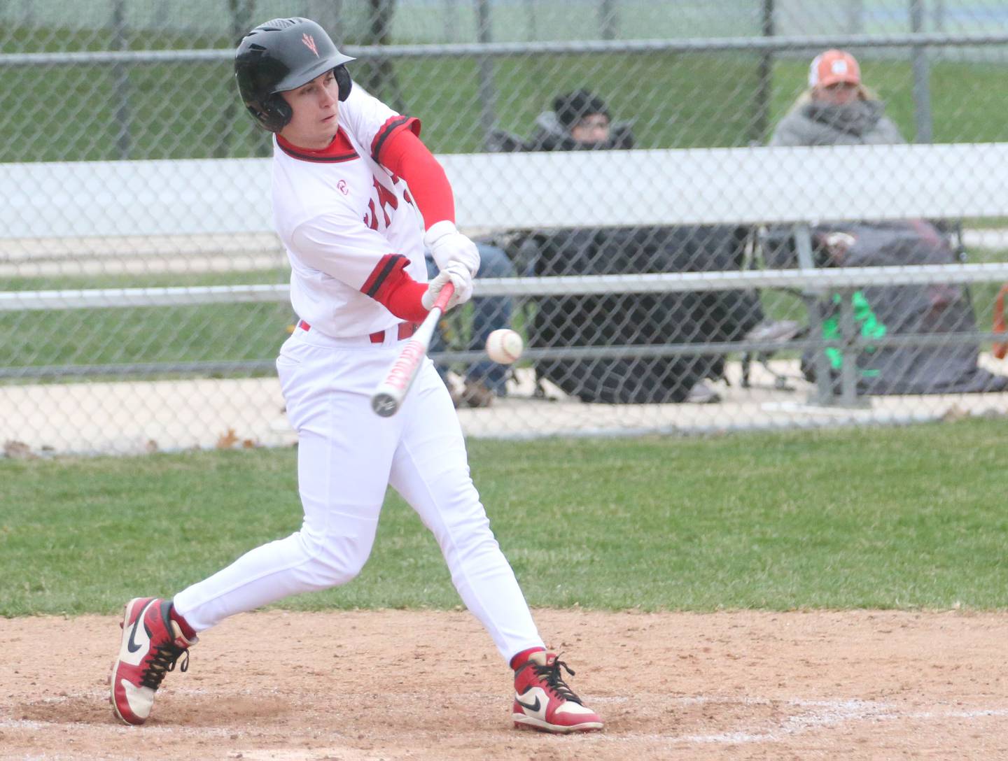 Hall's Jaxon Pinter smacks a hit against Ottawa on Tuesday, April 1, 2025 at Ottawa High School.
