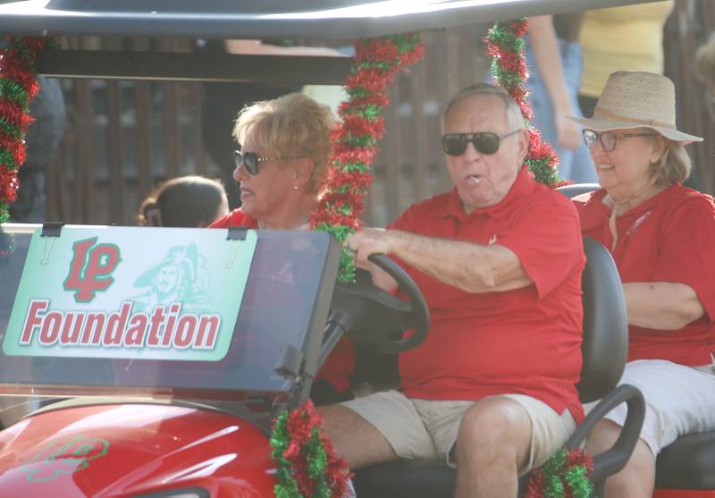 L-P Foundation members ride during the L-P homecoming parade on Thursday, Oct. 2, 2025 downtown La Salle.