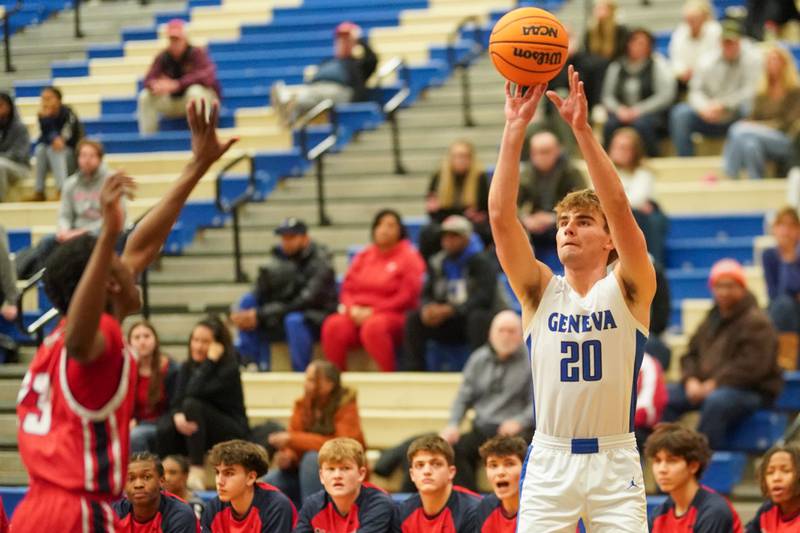 Geneva’s Jack Hatton (20) shoots a three pointer against West Aurora during a MLK Day of Hoops basketball game at Geneva High School on Monday, Jan. 20, 2025.