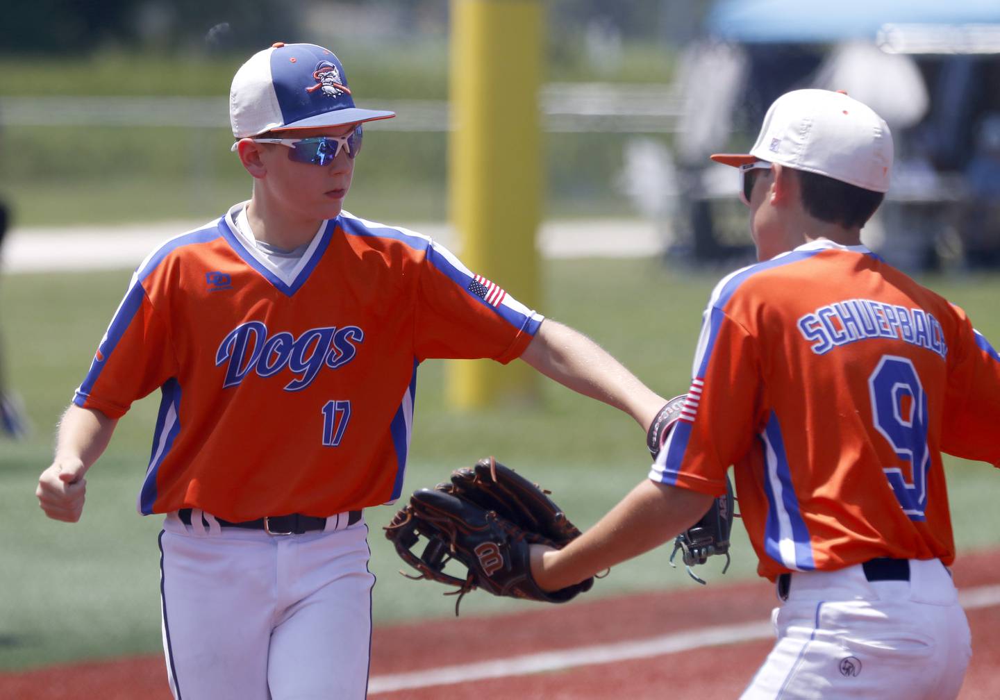 Windy City Hit Dog’s —Offdenkamp’s  Andrew Offdenkamp celebrates with his teammate, Brayden Schuepbach during a semi-final baseball game against The Barrington Broncos Red in a Under 13 McHenry County Youth Sports Association’s Summer International Championship baseball tournament on Monday, July 14, 2025, at the Mickey Sund Baseball Complex in Crystal Lake's Lippold Park.