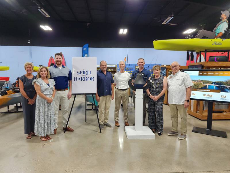 Starved Rock Country Community Foundation and Heritage Harbor Ottawa representatives launched The Spirit of the Harbor fund recently at Quest Watersports in Ottawa. Pictured (from left) are SRCCF board members Shelly Carey and Tracy Bedeker, HHO Community Manager Jacob Valle, SRCCF board member Bob Eschbach and CEO Fran Brolley, HHO Director of Finance and Strategy and SRCCF board member Pierre Alexander, SRCCF co-founder Pamela Beckett and HHO CEO and founder Tom Heimsoth.