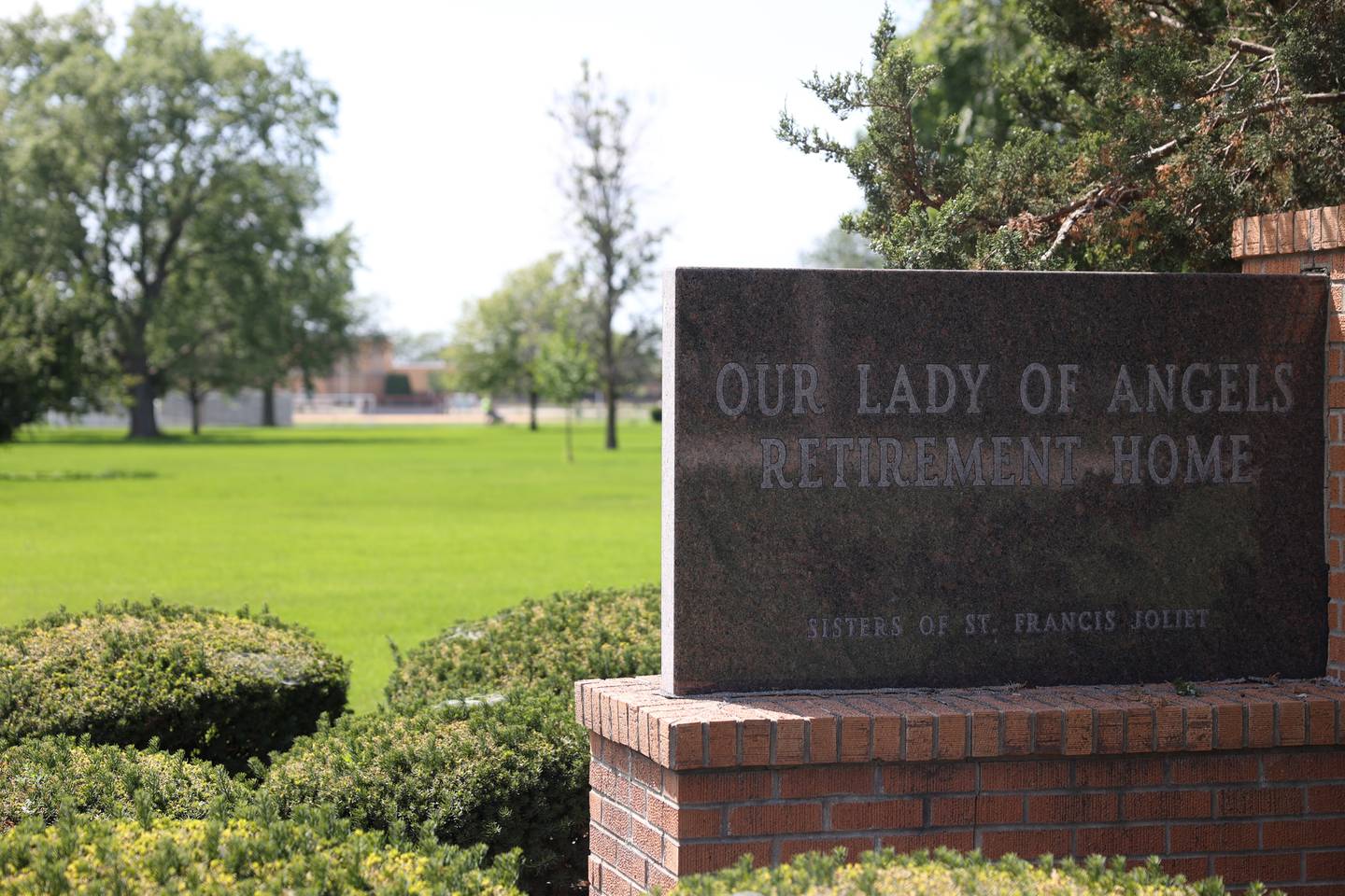 Our Lady of Angels is schedule to be demolished. Joliet Catholic Academy, seen in the background, is interested in purchasing neighboring Our Lady of Angels to expand the campus.