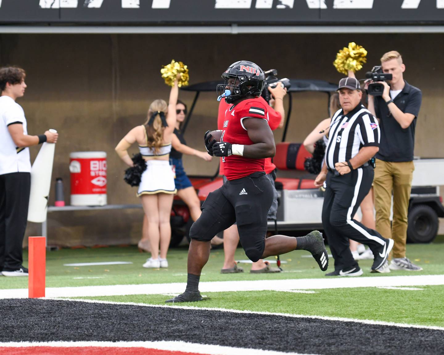 Northern Illinois Huskie Antario Brown (1) breaks away from the Vanderbilt defenders and runs into the end zone for a touchdown late in the second quarter Saturday Sep. 17th at Huskie Stadium in DeKalb.