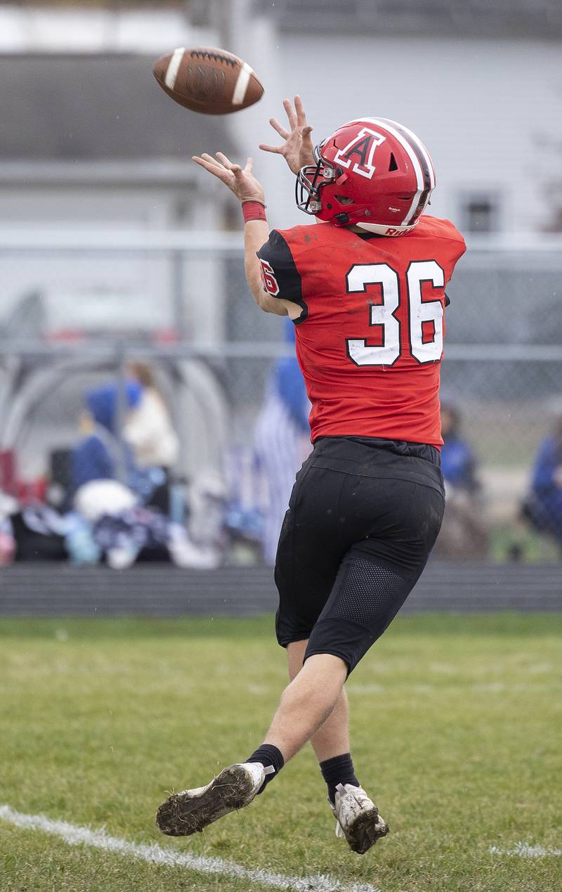 Amboy’s Caleb Yanos hauls in a pass against Martinsville Saturday, Nov. 9, 2024, in round two of the 8-man football playoffs.