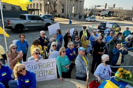 Crowd gathers in Dixon for vigil supporting Ukraine