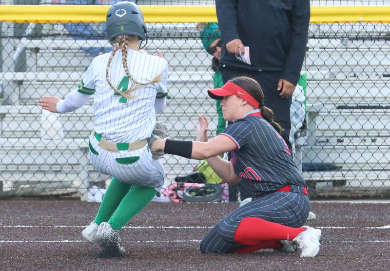 Seneca's Graysen Provance is tagged out at third base by Ottawa's Aubrey Sullivan on Friday, May 1, 2026 at Seneca High School.