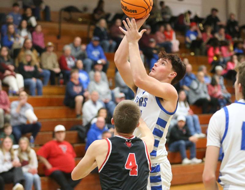 Princeton's Owen Hartman lets go of a shot over Hall's Luke Bryant on Friday, Feb. 13, 2026 at Princeton High School.