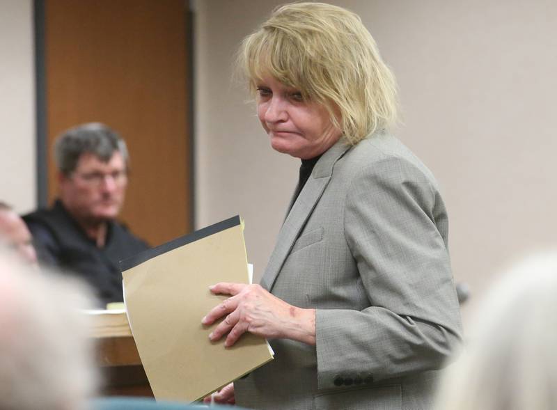 Attorney Celeste Stack gathers exhibits during a mini trial evidentiary hearing regarding the Chester Weger case on Monday, May 12, 2025 at the La Salle County Government Complex in Ottawa.