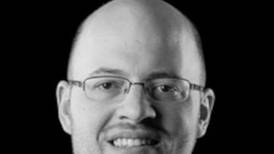 OHS associate band director named quarterfinalist in music educator award