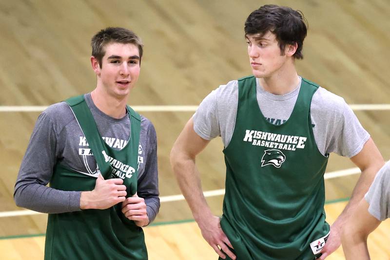 Former Indian Creek High School basketball players, Cam Russell (left) and Brennen McNally, both now attending Kishwaukee College, talk during a break in practice Wednesday, Jan. 11, 2023, at the school.