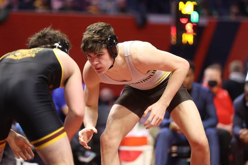 Joliet Catholic’s Mason Alessio faces off against Montini’s Jayden Colon in the Class 3A 145lb. championship match at State Farm Center in Champaign. Saturday, Feb. 19, 2022, in Champaign.