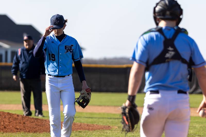 Logan Philhower (19) of Bureau Valley walks towards Cather after closing inning on Tuesday, April 8, 2025 at Putnam County High School in Granville.