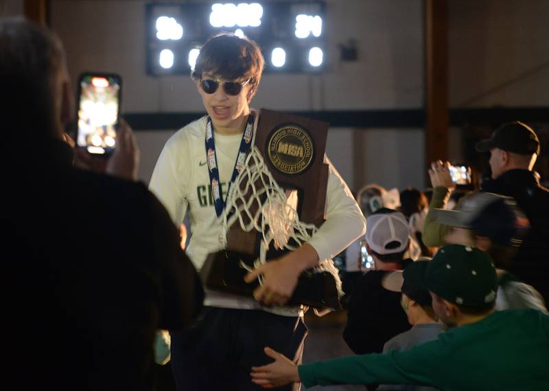 Glenbard West state basketball players including Braden Huff are introduced during the pep rally held Sunday March 13, 2022.