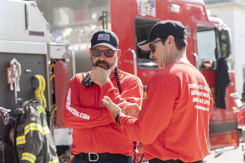 Firefighter instructors Dan Cotrell (left) and Mo Khazaah speak at the end of a training session Tuesday, Sept. 23, 2025, in Dixon.