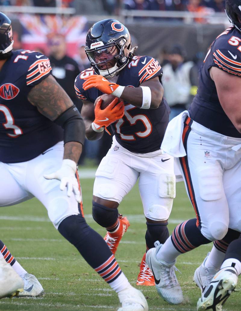 Chicago Bears running back Kyle Monangai finds a hole in the Pittsburgh Steelers defensive line Sunday, Nov. 23, 2025, during their game at Soldier Field in Chicago.