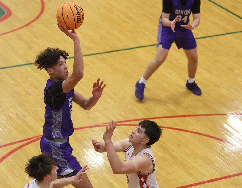 Dixon's Armahn McGowan lets go of a shot over L-P's Erick Sotelo during the Class 3A Regional semifinal game on Wednesday, Feb. 25, 2026 in Sellett Gymnasium at L-P High School.
