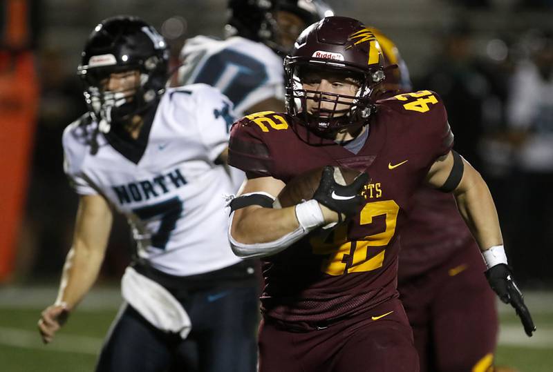 Richmond-Burton's Blake Livdahl runs with the ball during a Kishwaukee River Conference football game against Woodstock North on Friday, Oct. 11, 2024, at Richmond-Burton High School.