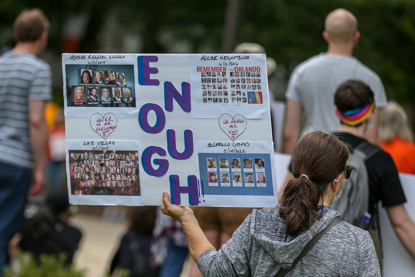 A Participant holds up a sign during the March for Lives rally and march. June 11, 2022