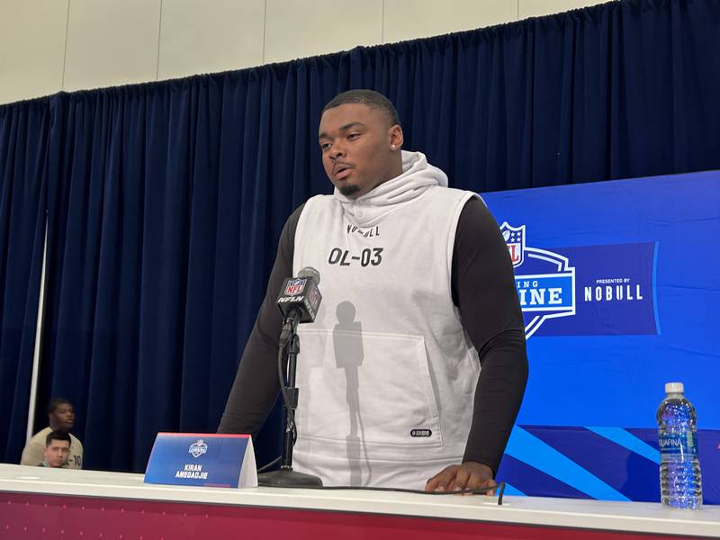Hinsdale Central alumnus Kiran Amegadjie speaks with reporters at the NFL Combine in Indianapolis on Saturday.