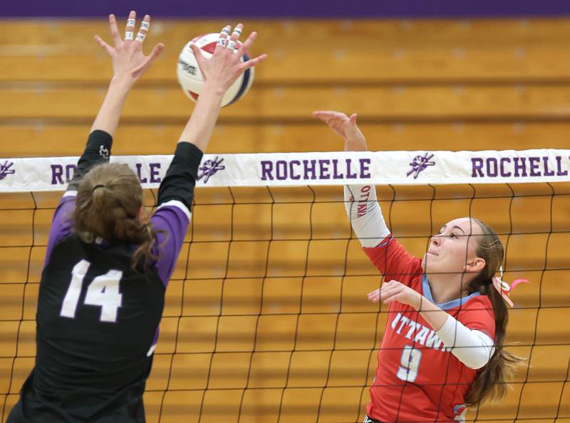 Ottawa's Ashlynn Ganiere tries to spike the ball by Dixon’s Leah Carlson Tuesday, Oct. 28, 2025, during their Class 3A regional semifinal match at Rochelle High School.