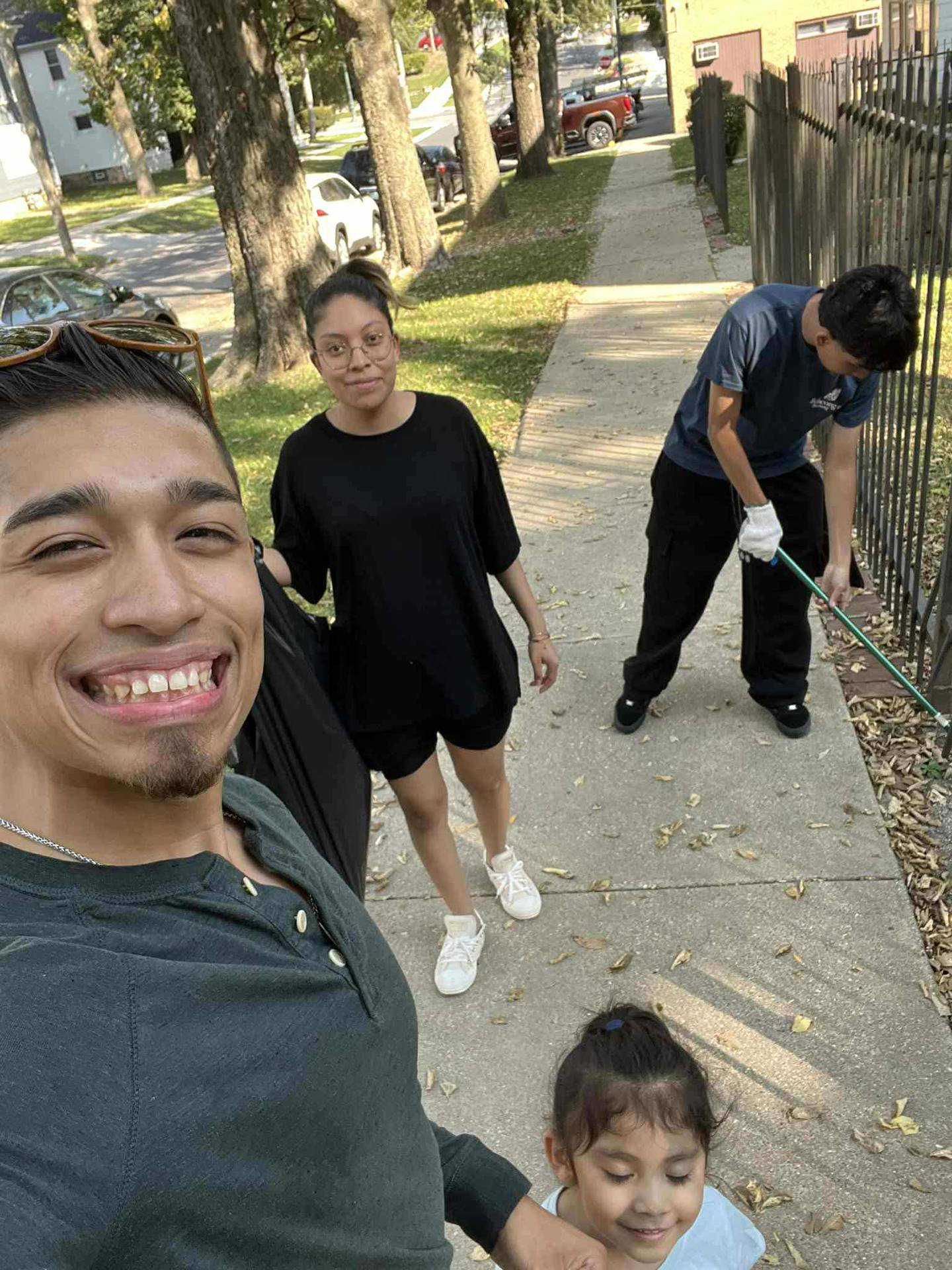 Volunteers are seen participating in the fall 2025 Bicentennial Bluffs Neighborhood Association neighborhood cleanup. Volunteers are needed for the spring event, which will take place Saturday, May 2, 2026.