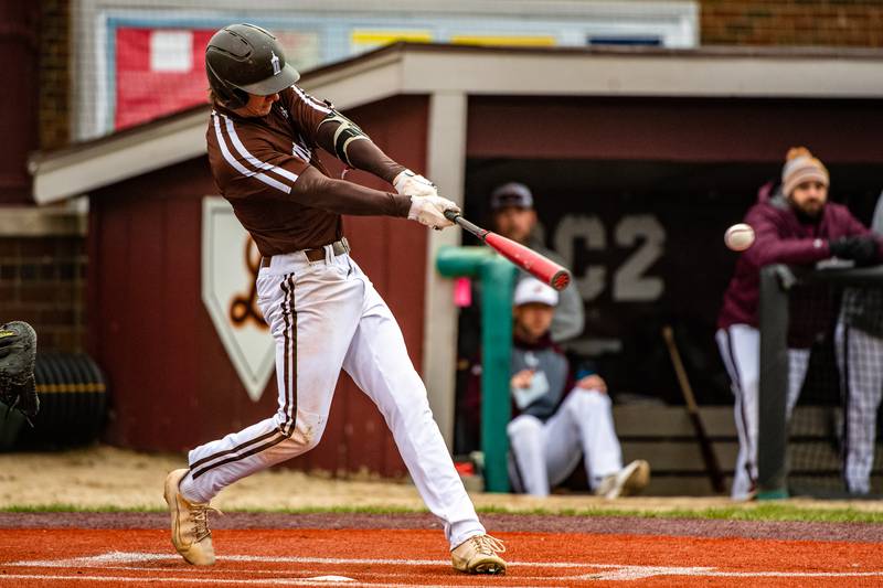 Joliet Catholic Academy's Trey Swiderski bats  during a game against Lockport  Friday March 24, 2023 at Flink Field in Lockport