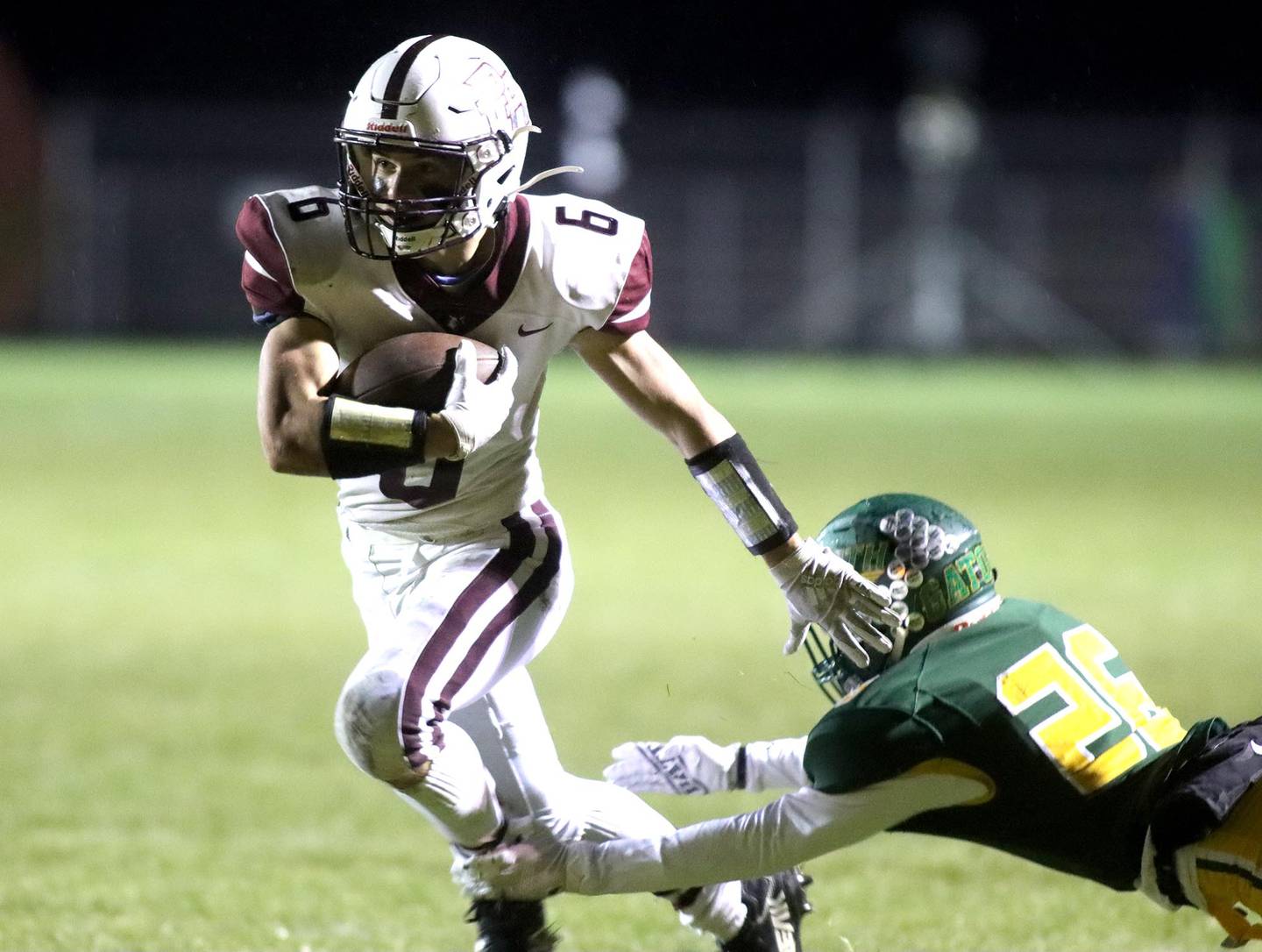 Prairie Ridge’s Luke Vanderwiel eludes Crystal Lake South’s Josh Saldana in varsity football action at Ken Bruhn Field on the campus of Crystal Lake South Friday evening.