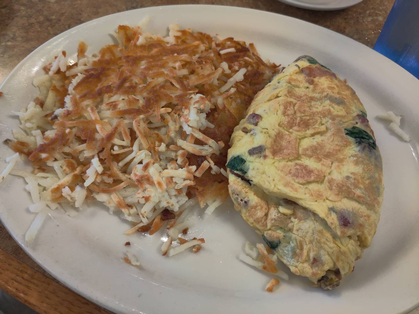 Senior omelet and hash browns Briana's Pancake House Restaurant in Batavia.