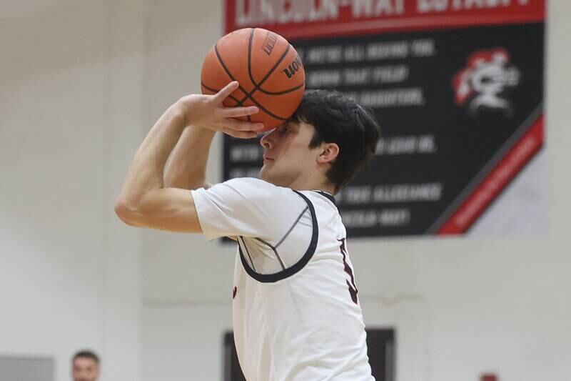 Lincoln-Way Central’s Ben McLaughlin lines up the three point shot against Lockport on Tuesday, Jan. 23rd, 2024 in New Lenox.