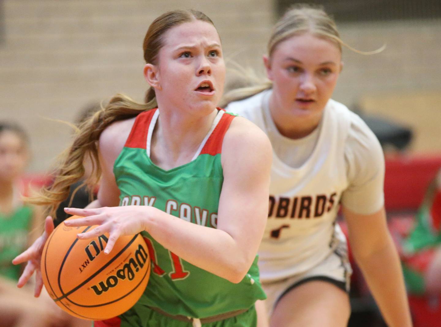 L-P's Elizabeth Sines eyes the hoop as Metamora's Liv Vaughn trails behind her during the Ottawa Girls Holiday Tournament on Monday, Dec. 16, 2024 in Kingman Gym at Ottawa High School.