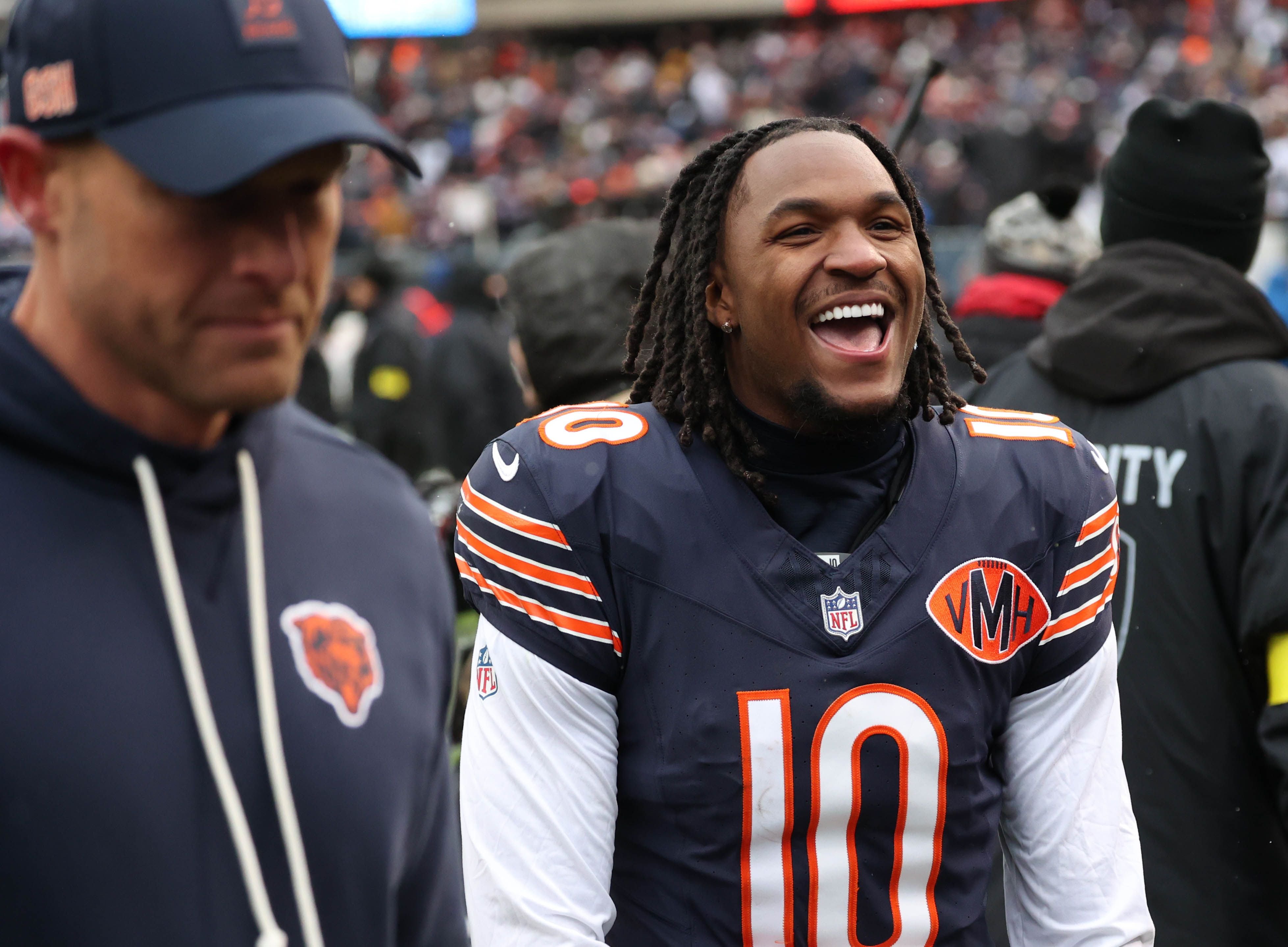 Chicago Bears wide receiver Luther Burden III celebrates along side head coach Ben Johnson Sunday, Nov. 9, 2025, after their 24-20 win over the New York Giants at Soldier Field in Chicago.