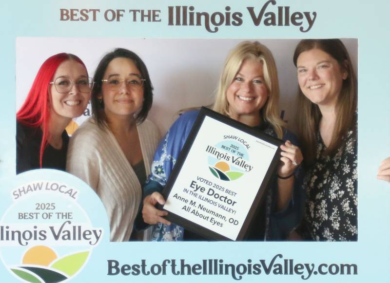 The staff with All About Eyes pose for a photo during the second annual Best of the Illinois Valley event on Thursday at the Auditorium Ballroom in La Salle.