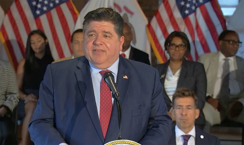 Gov. JB Pritzker speaks at a news conference in Chicago prior to signing a bill aimed at giving more Illinoisans who leave a correctional facility access to a free state ID.