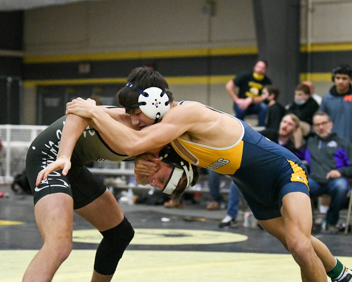 Sterling Drew Kested wrestles in the 145 weight class during the 3rd place match up where he took fourth on Sat. Jan 8th during the wrestling invite at Sycamore High School.